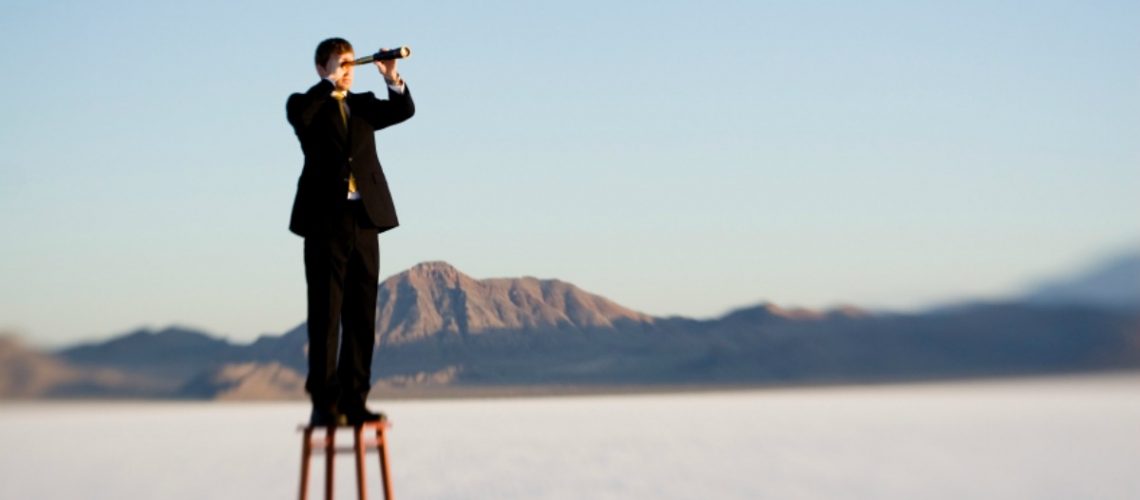 guy-standing-on-the-chairblog
